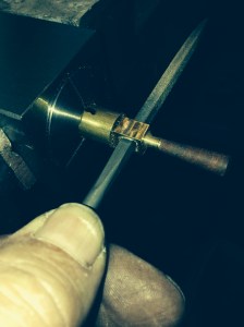 Filing the square hole corners.  (you didn't really believe that iI would drill a square hole did you?)