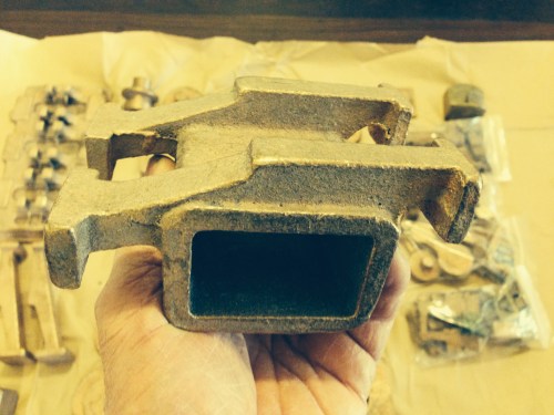 Looks like the condensor chamber, as part of the engine frame.