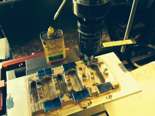 Tapping the main bearing blocks using the Tapmatic and Tap Magic.