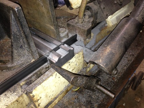 Using a drop bandsaw to cut off the milled blocks.  Less than 1mm clearance. 