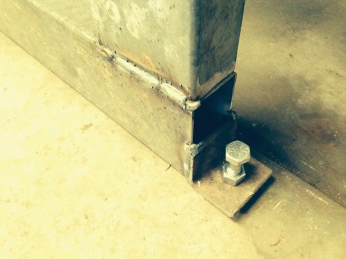 Levelling bolts at each corner