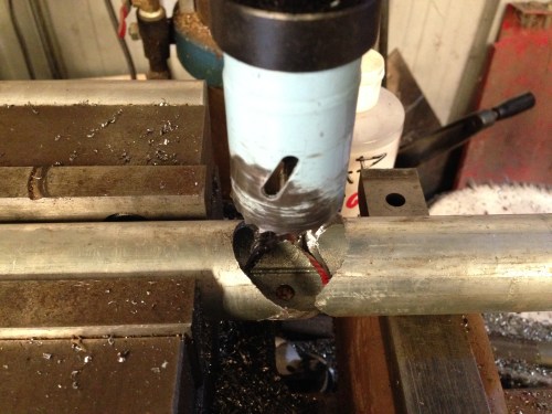 Using the bometal hole cutter in the drill press.  A staged photo, but it does show how it happened.
