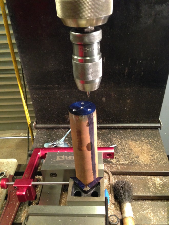 The centres were drilled on the CNC milling machine, after the locating the top of the bar