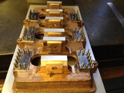 The 6 main bearings sitting in their slots.  The hold down bolts are ready to be installed.  The bearing surfaces will be bored when I have some 3 phase power again.