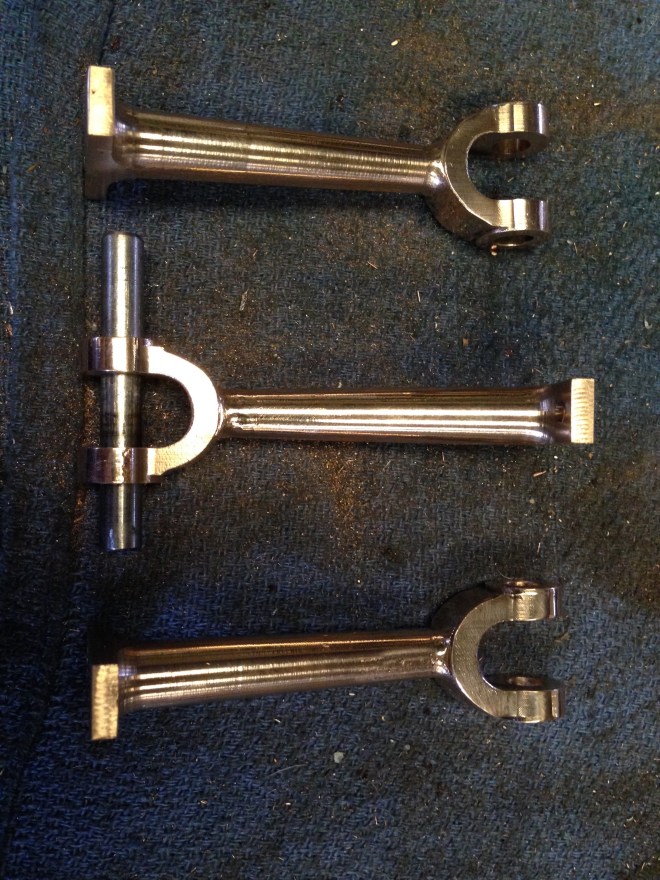 The finished con rods.  I wont bore you with the photos of milling the wishbone slots.  