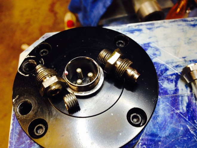 The top of the spindle.  The fittings, with the broken one on the left.