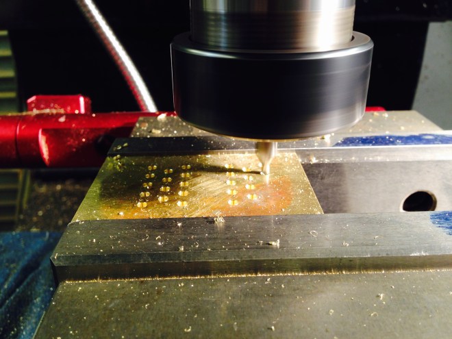CNC drilling the end plates.  Centre drilling initially.  The 112 operations proceeded perfectly.  Did I say before that I love CNC.