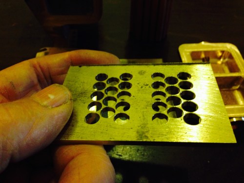 End plate holes.  No breakthroughs, despite only 0.5mm between holes.