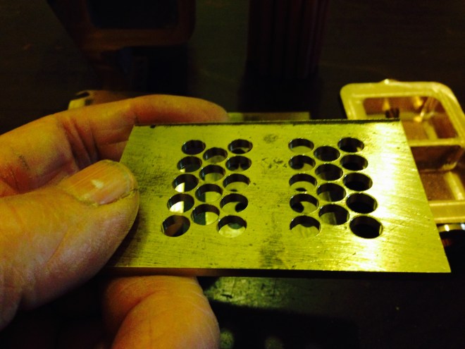 End plate holes.  No breakthroughs, despite only 0.5mm between holes.