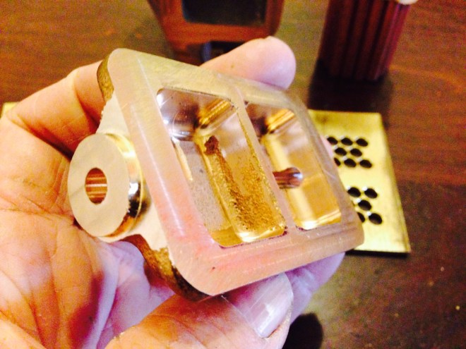 An end cover after machining.  The bosses and holes were CNC'd. 