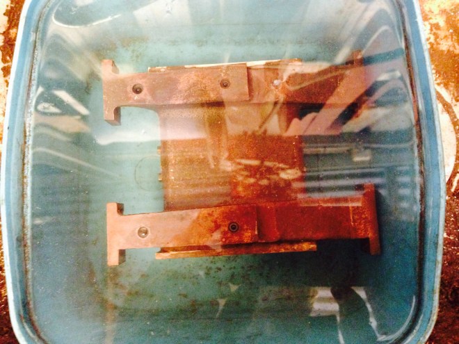 The condenser unit, after today's soldering fix.  Note: there are no air bubbles rising!  It is air-water tight, at atmospheric pressure.  That is enough, because it is a low pressure unit when in use.