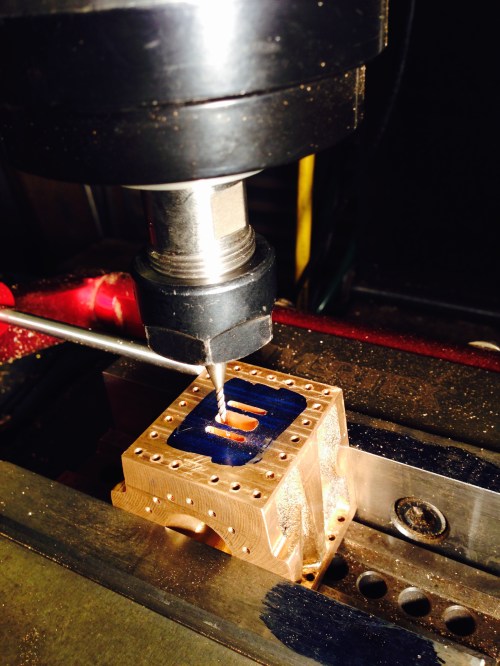 Milling the slots. Here I am using a 4.7mm end mill to cut the exhaust port. Straight forward. Feed 100mm/min, 4000rpm, 0.5mm slices.