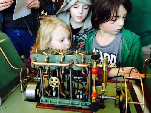 Some future model engineers, viewing a very nice, running, triple expansion steam engine.