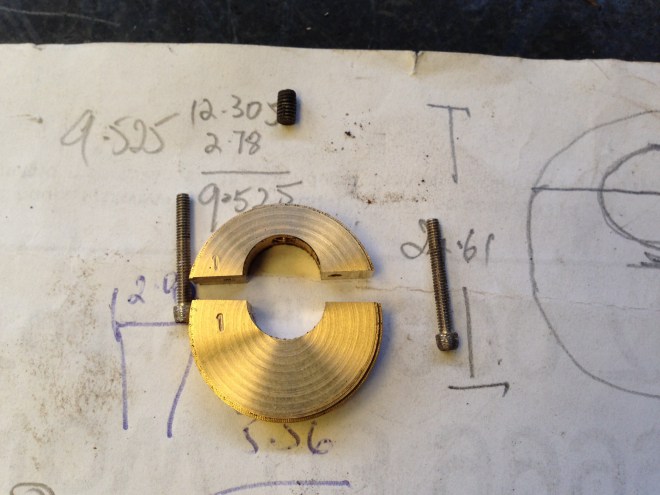 The components of each eccentric.  The brass "halves", the bolts and the grub screw.