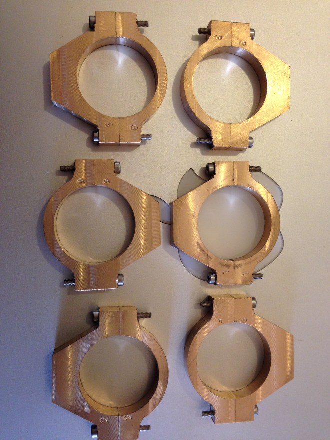 The eccentric straps, also made in 2 pieces, joined with M2 bolts.  A groove is turned in each circle, and a corresponding ridge is turned in each eccentric.  All very precise and fiddly.