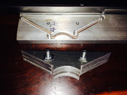 The sacrificial holding plate, and the components. I tried a wooden sacrificial holding plate, but it was just not adequately rigid, and the finish was poor.