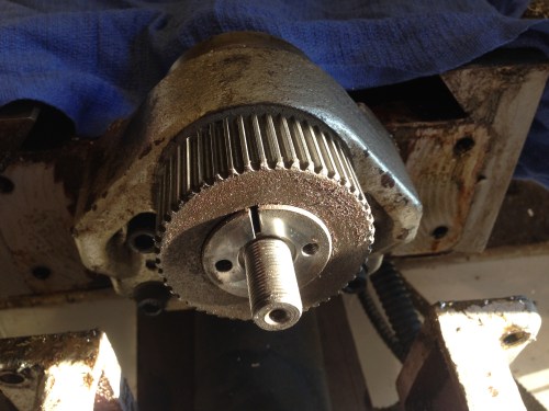 The bearing housing, toothed gear and tapered bush.