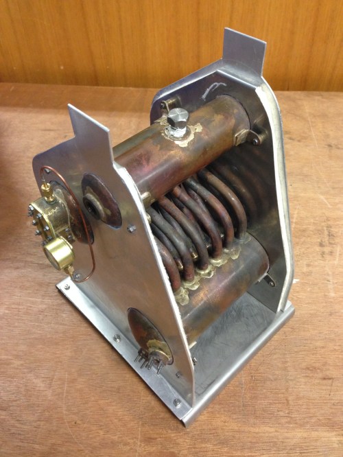 Model ship's boiler. it is approx 300-400mm high. The fire box is stainless steel. The copper boiler and water tank and superheater were TIG welded. The water tubes are silver soldered.