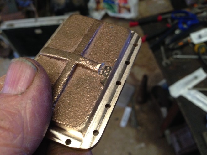 The damaged, machined casting.